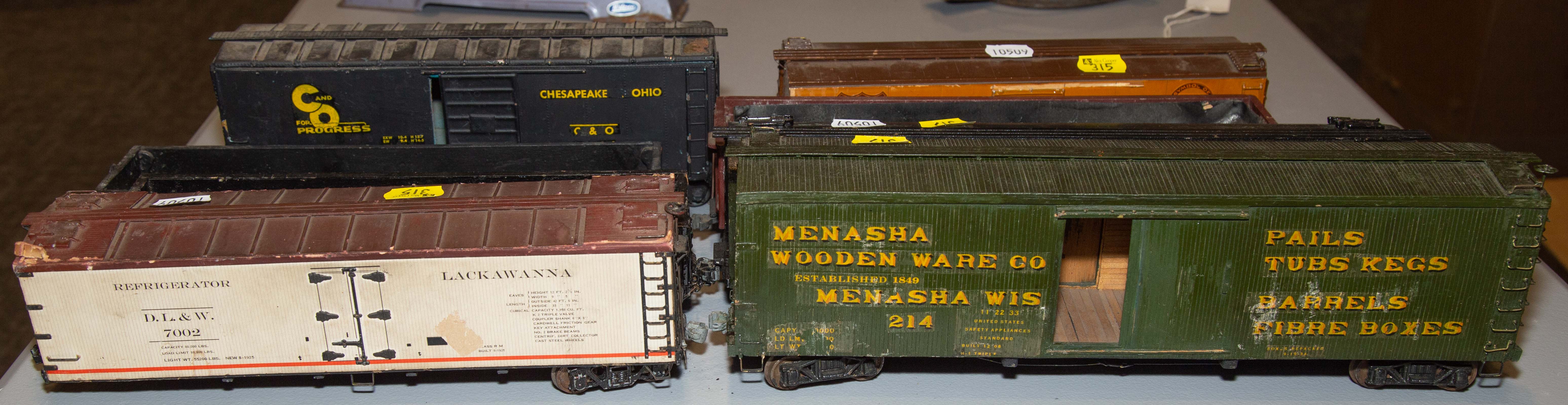 Appraisal: SEVEN ASSORTED PAINTED METAL WOOD SCALE TRAINS Circa - s