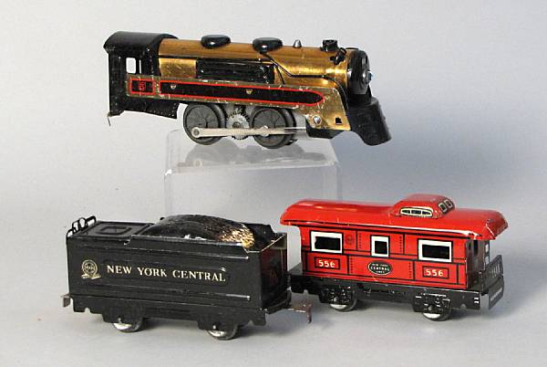 Appraisal: Marx train cars Lot features copper black engine with NYC