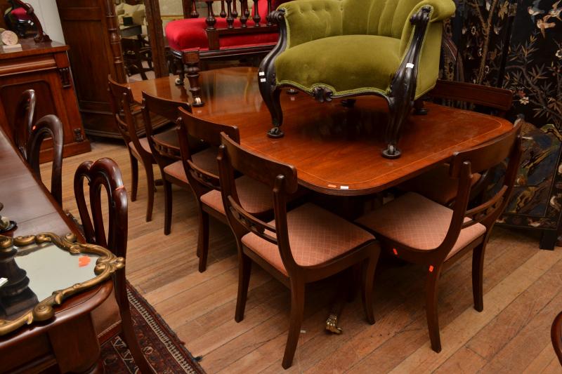 Appraisal: A REGENCY STYLE DINING SETTING EXTENSION TABLE ELEVEN CHAIRS AND