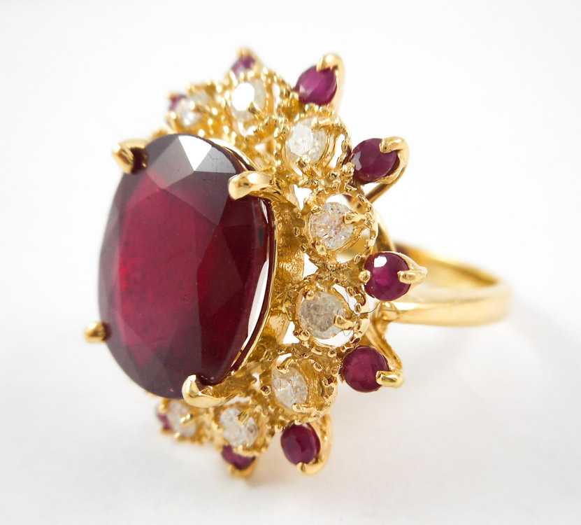 Appraisal: RUBY DIAMOND AND FOURTEEN KARAT GOLD RING with twelve round-cut