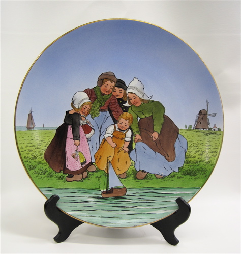 Appraisal: METTLACH PLAQUE DIAMETER hand painted under glaze Depicts four Dutch