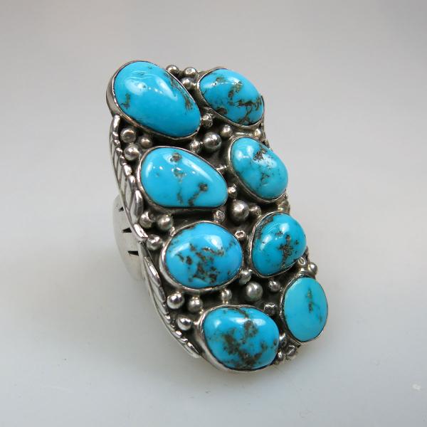 Appraisal: Navajo Sterling Silver Ring set with freeform turquoise cabochons Ring