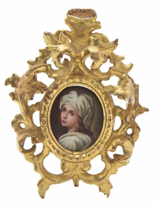 Appraisal: A Continental Portrait Miniature on Porcelain depicting a provincial maiden