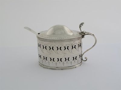 Appraisal: A George III pierced oval mustard pot with a domed