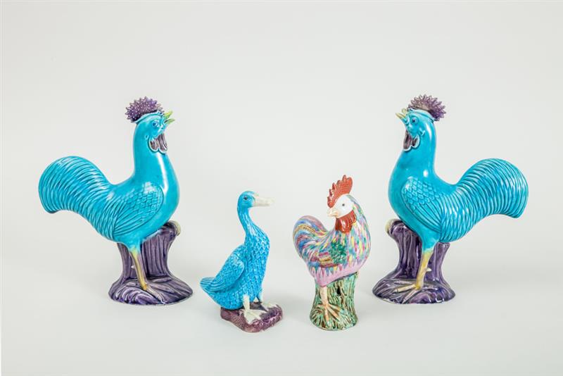 Appraisal: PAIR OF CHINESE TURQUOISE-GLAZED PORCELAIN FIGURES OF ROOSTERS A TURQUOISE