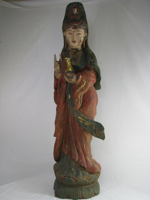 Appraisal: Large polychrome carved wood Quan Yin figure Painted in tones