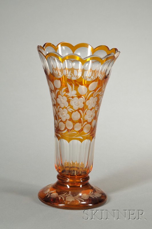 Appraisal: Bohemian Amber Flashed Cut-to-clear Vase early th century trumpet shaped