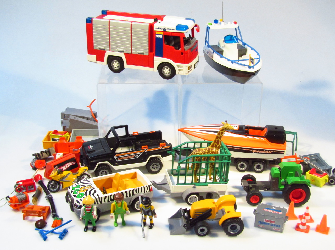 Appraisal: Various Playmobil and other toys to include speed boat cm