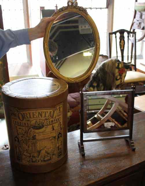 Appraisal: A SMALL OVAL GILT MIRROR an indestructible trunk container of