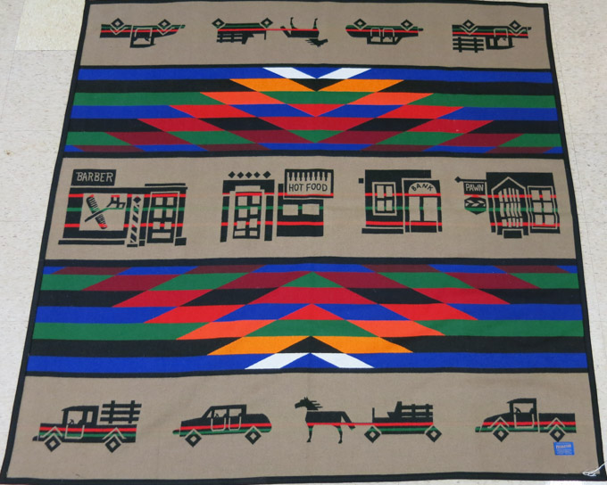 Appraisal: PENDLETON WOOLEN MILL THROW BLANKET with two pictorial borders top