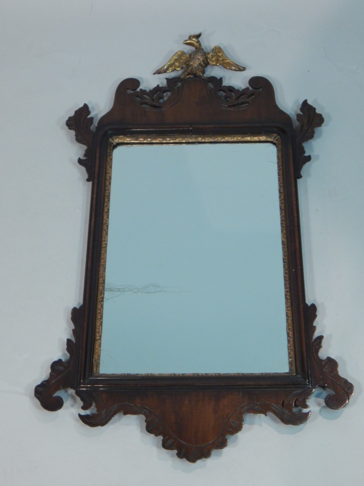 Appraisal: A George III mahogany fret framed wall mirror the pierced