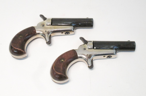 Appraisal: PAIR OF COLT FOURTH MODEL SINGLE SHOT DERRINGERS short caliber