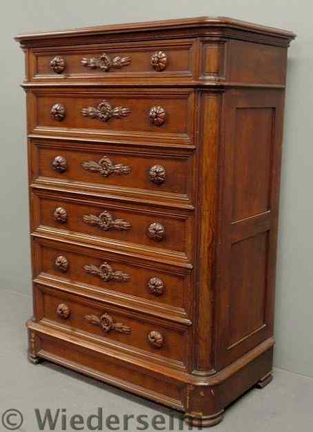 Appraisal: Victorian carved walnut high chest with carved escutcheons Matches Lots