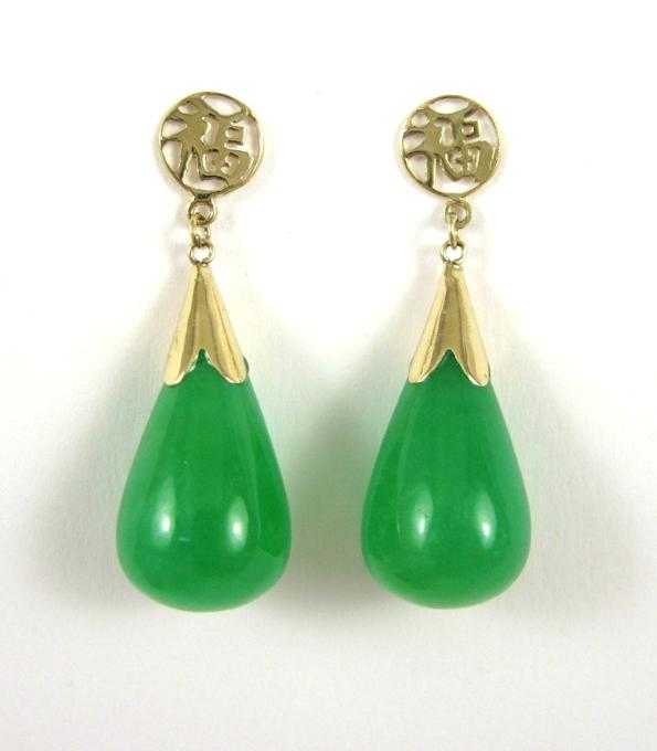 Appraisal: PAIR OF JADE AND FOURTEEN KARAT GOLD EARRINGS each having