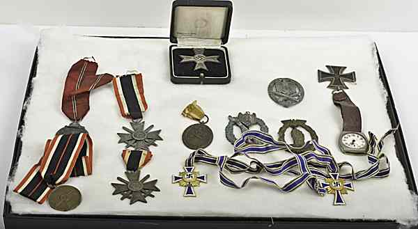 Appraisal: German WWII Assorted Medal and Awards Lot of Twelve Lot