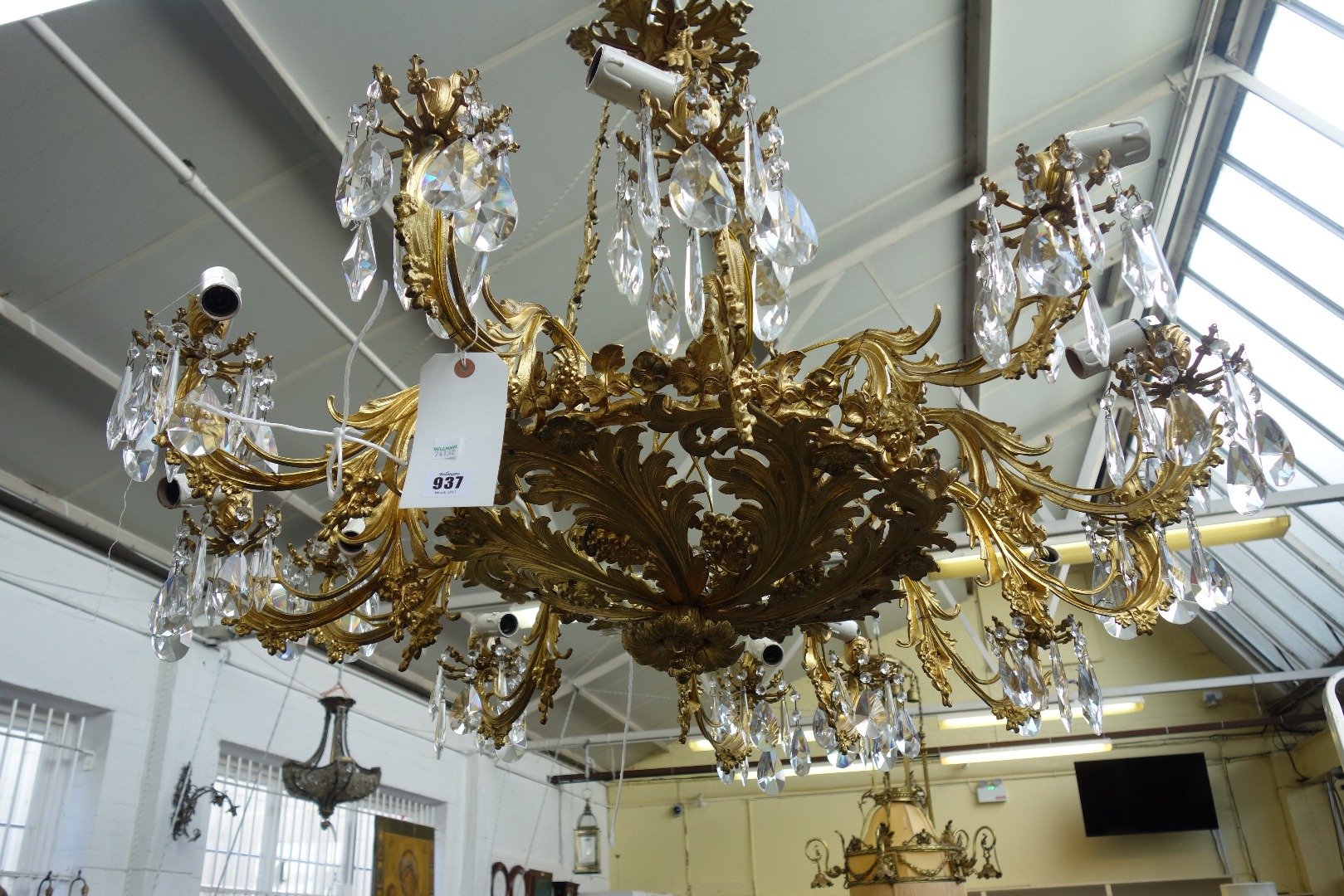 Appraisal: A French gilt metal twelve branch chandelier mid-late th century