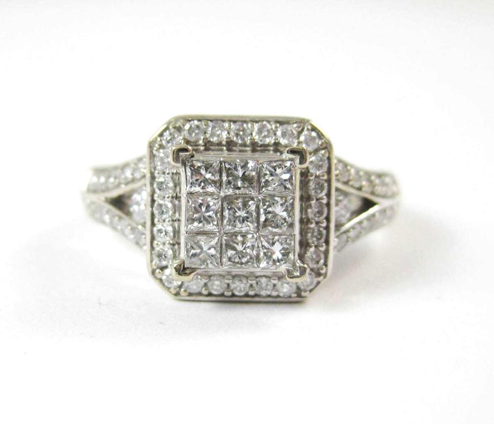 Appraisal: DIAMOND AND FOURTEEN KARAT WHITE GOLD RING centering nine illusion