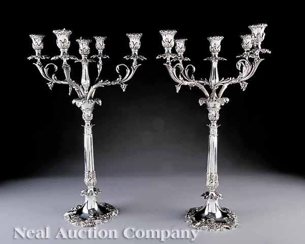 Appraisal: A Pair of Monumental Silverplate Five-Light Candelabra with foliate bob