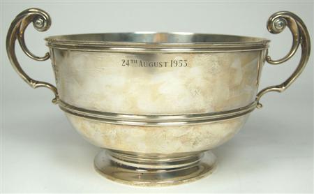 Appraisal: A twin handled punch bowl DW JW London of simple