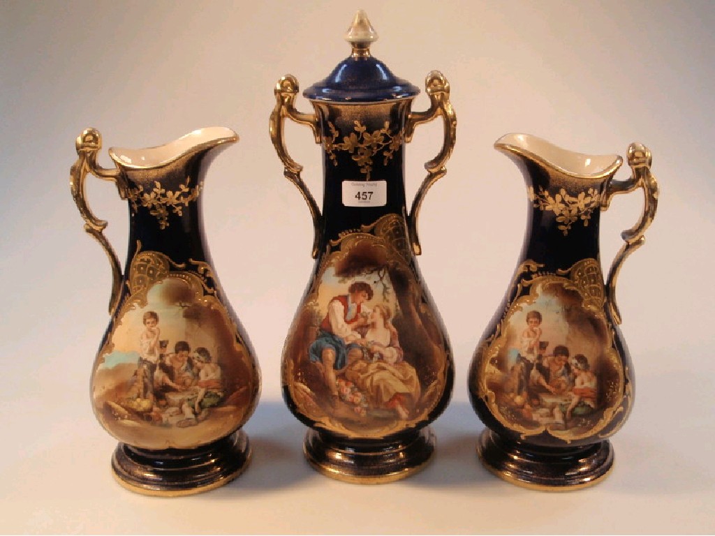 Appraisal: A late thC pottery garniture comprising a two-handled vase and