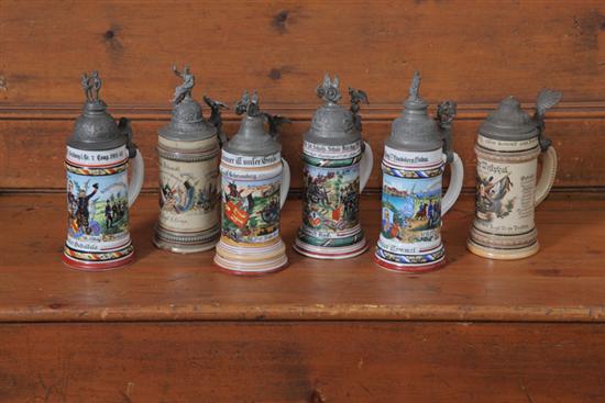 Appraisal: SIX GERMAN STEINS WITH PEWTER LIDS Four with military scenes