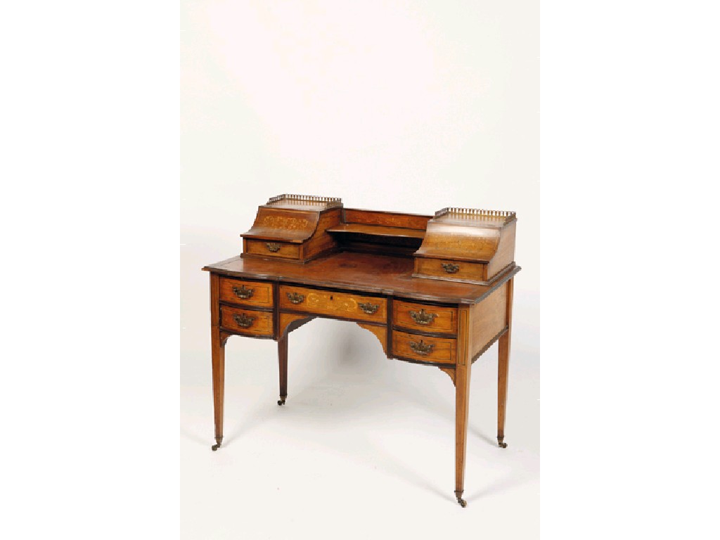 Appraisal: A VICTORIAN ROSEWOOD AND SATINWOOD INLAID WRITING DESK the shaped