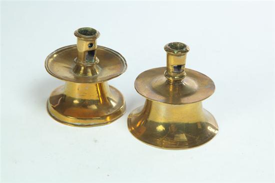 Appraisal: TWO BRASS CAPSTAN CANDLESTICKS Spain th century Small forms with