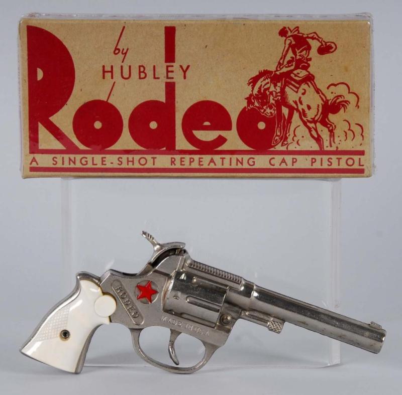 Appraisal: Hubley Rodeo Cap Gun Description Grips are badly warped Includes