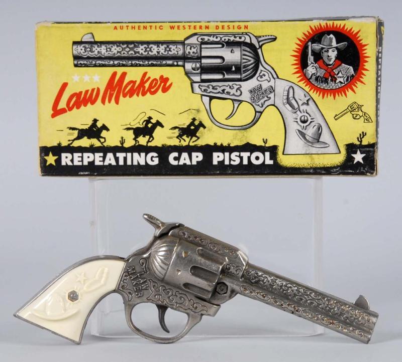 Appraisal: Cast Iron Lawmaker Cap Gun Description Works well Includes box