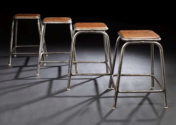 Appraisal: Suite of Four Industrial-Design Steel and Mahogany Stools early th