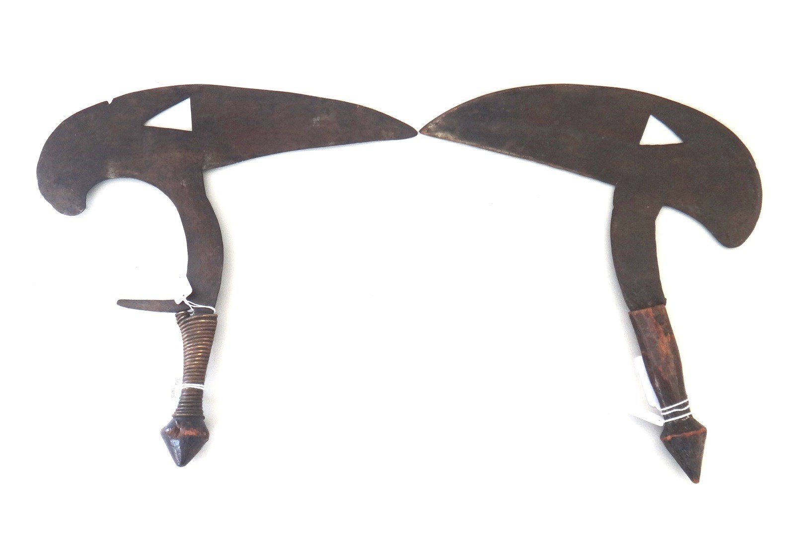 Appraisal: An African 'Musele' th century the 'bird headed' shaped steel