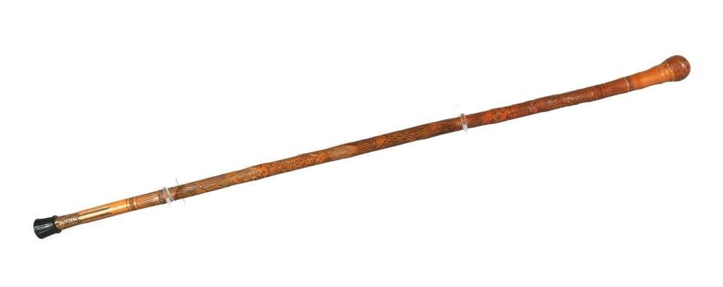 Appraisal: JAPANESE HAND CARVED CANEHand carved Japanese walking stick decorated with