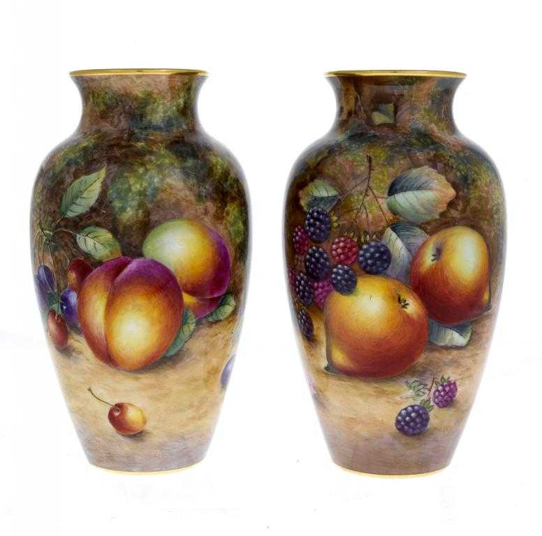 Appraisal: A PAIR OF ROYAL WORCESTER SHOULDERED OVIFORM VASES painted by