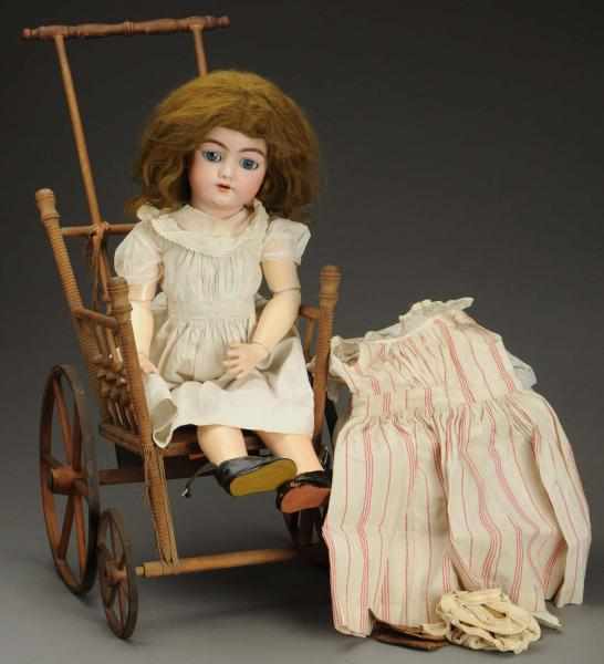 Appraisal: Pretty Handwerck Child Doll Clothes Stroller German bisque socket head