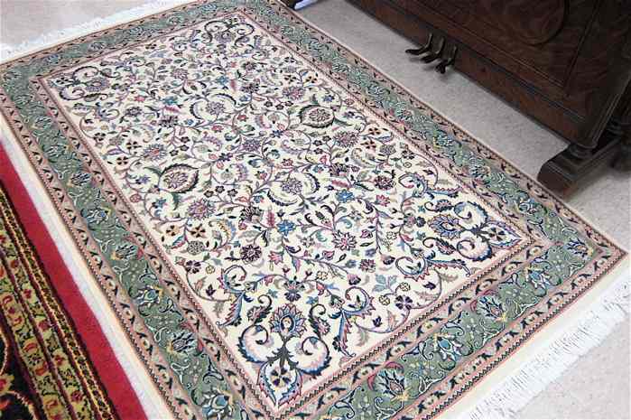 Appraisal: HAND KNOTTED ORIENTAL AREA RUG Pakistani-Persian hand knotted in a