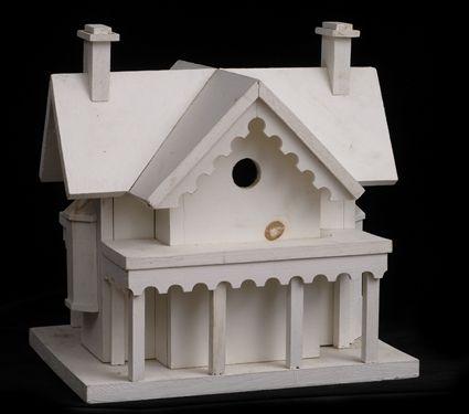 Appraisal: TWO WHITE PAINTED BIRD HOUSES MODERN One in the form