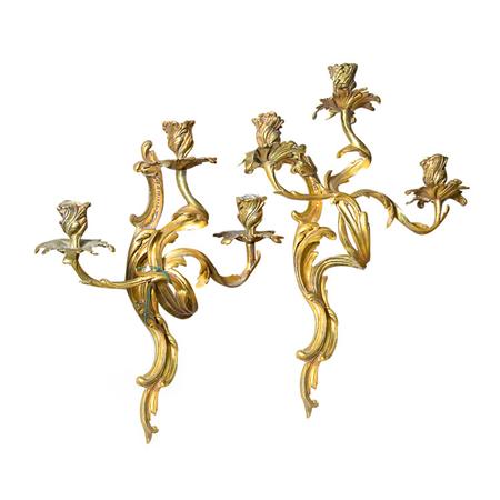 Appraisal: Companion Pair of Louis XV Style Gilt-Metal Three-Light Sconces Estimate