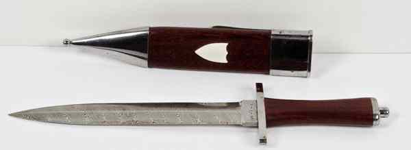 Appraisal: US Contemporary Sheath Knife by Sheldon Jones This wooden-handled spear