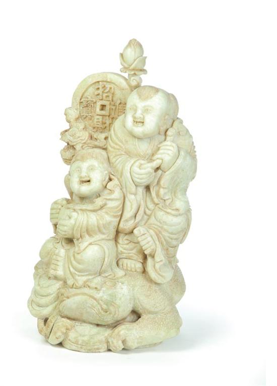 Appraisal: LARGE SOAPSTONE STATUE GROUP Asian mid th century Two children