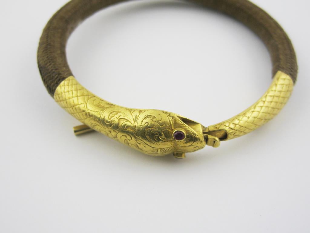 Appraisal: A Continental Snake Bracelet the woven hair band with engraved