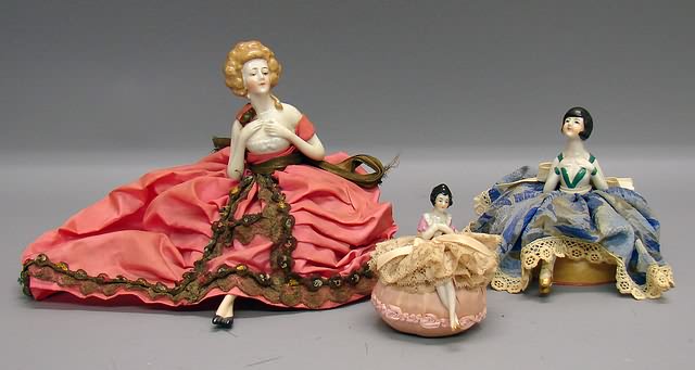 Appraisal: Lot of china half dolls mounted on pin cushions with