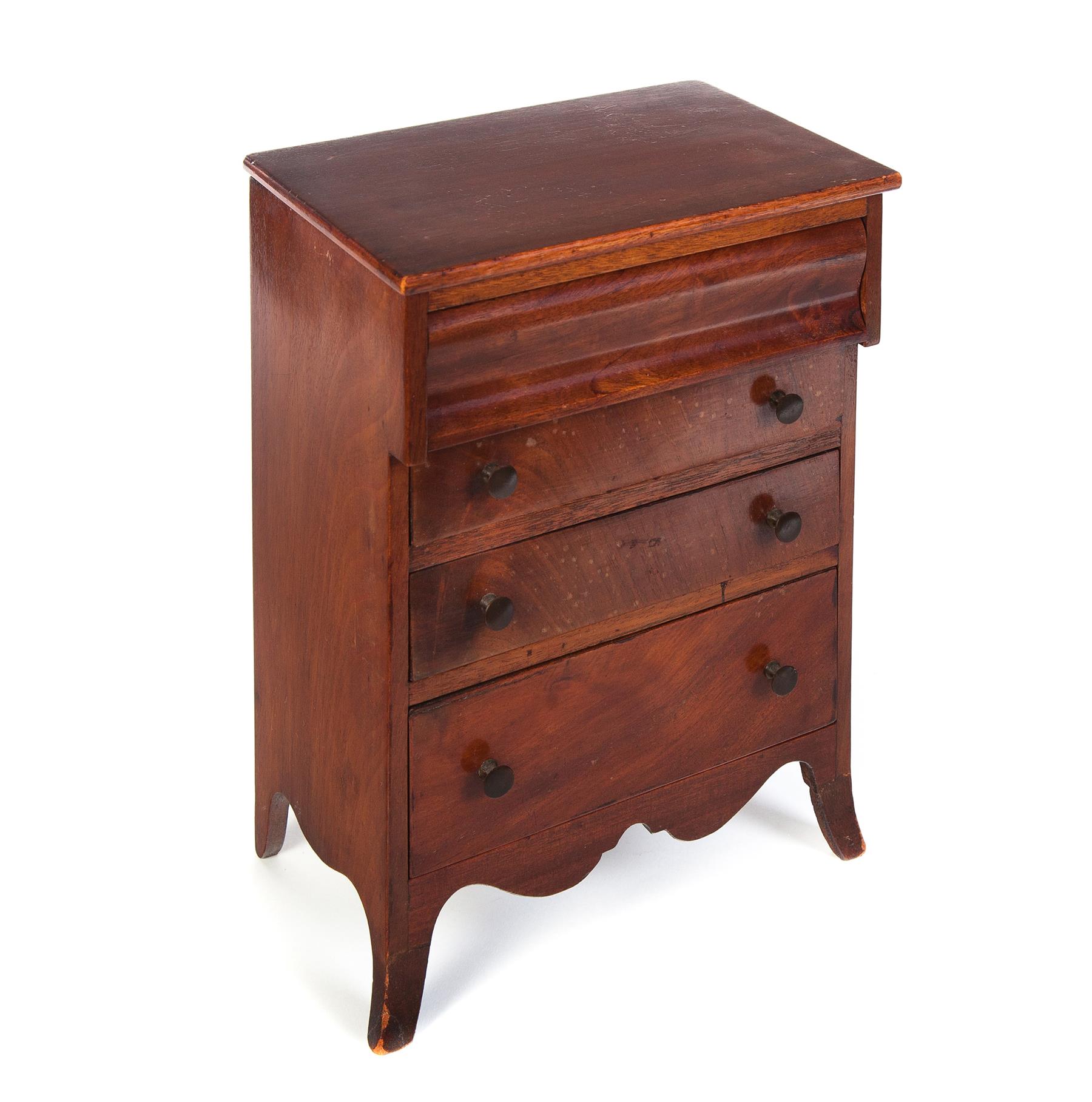 Appraisal: MINIATURE CHEST OF DRAWERS England late th century Mahogany and