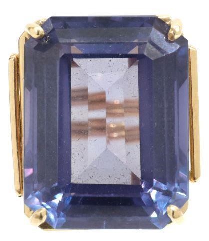 Appraisal: Estate kt yellow gold ring faceted stone with purple-blue hue