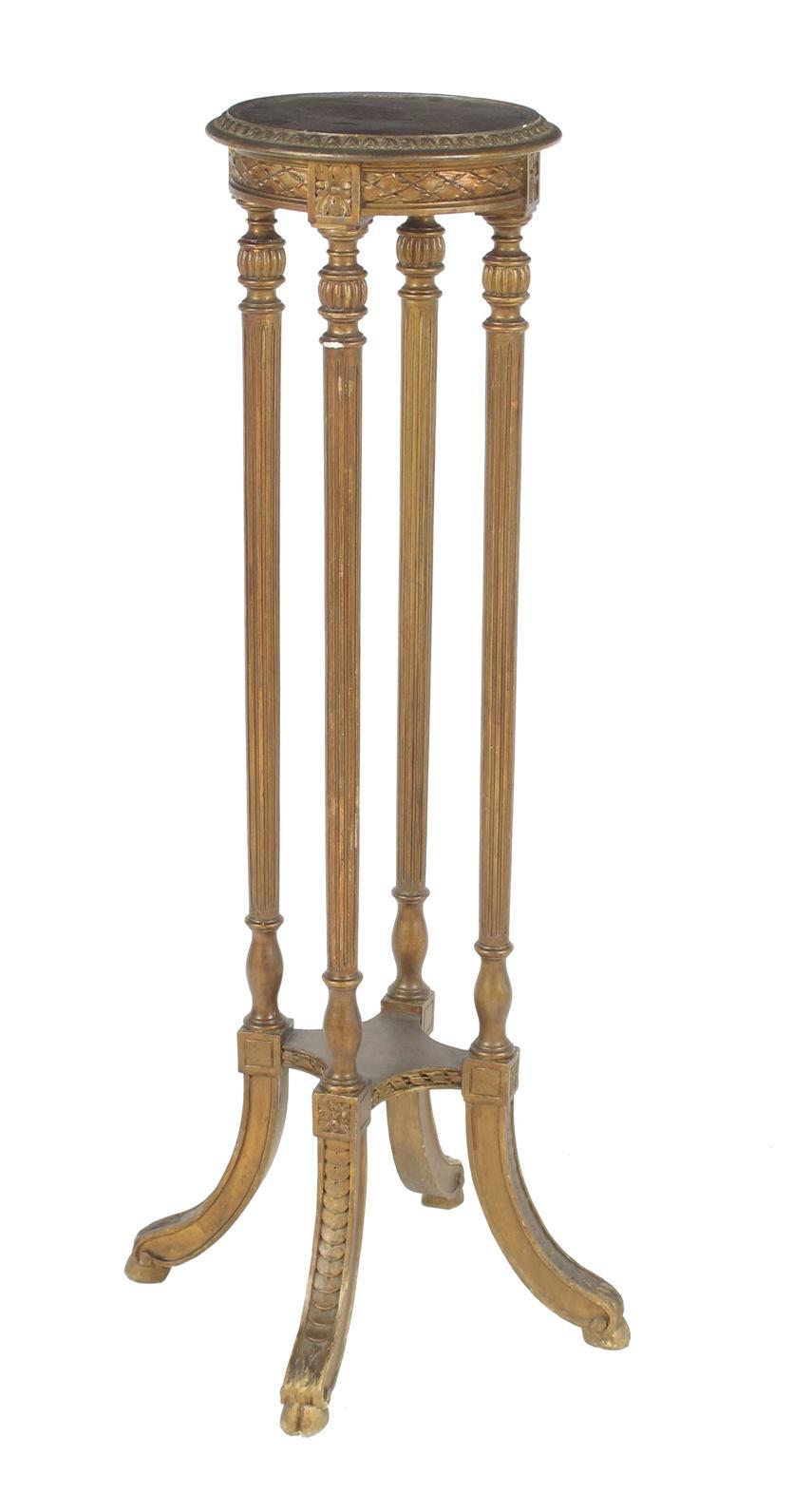 Appraisal: A late th century giltwood torch re