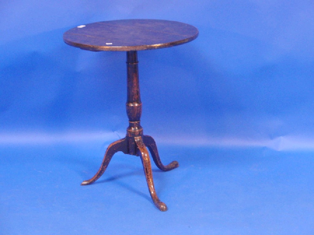 Appraisal: A Georgian oak circular tripod table