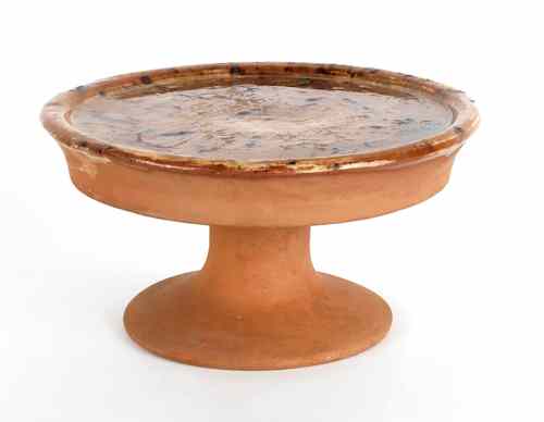 Appraisal: Unusual redware cake stand th c with manganese splotches h