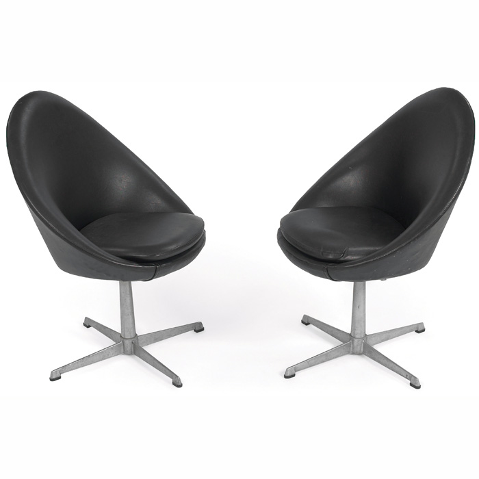 Appraisal: Overman swiveling lounge chairs pair egg-shaped forms aluminum bases with