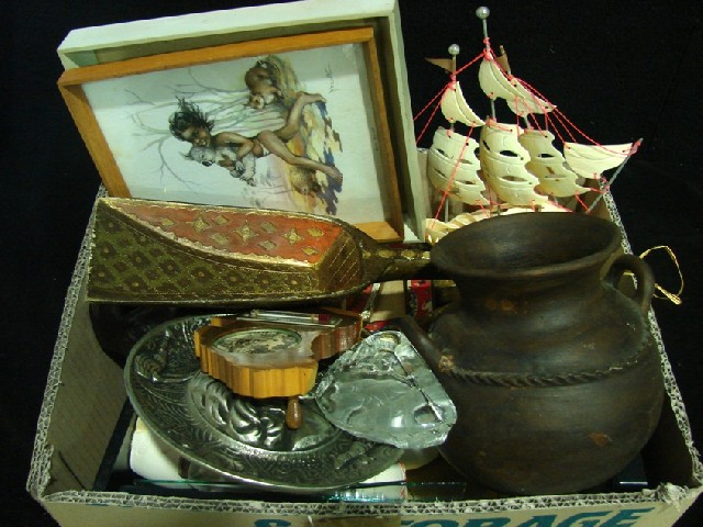 Appraisal: A boxed lot of collectables comprising a carved shell brig