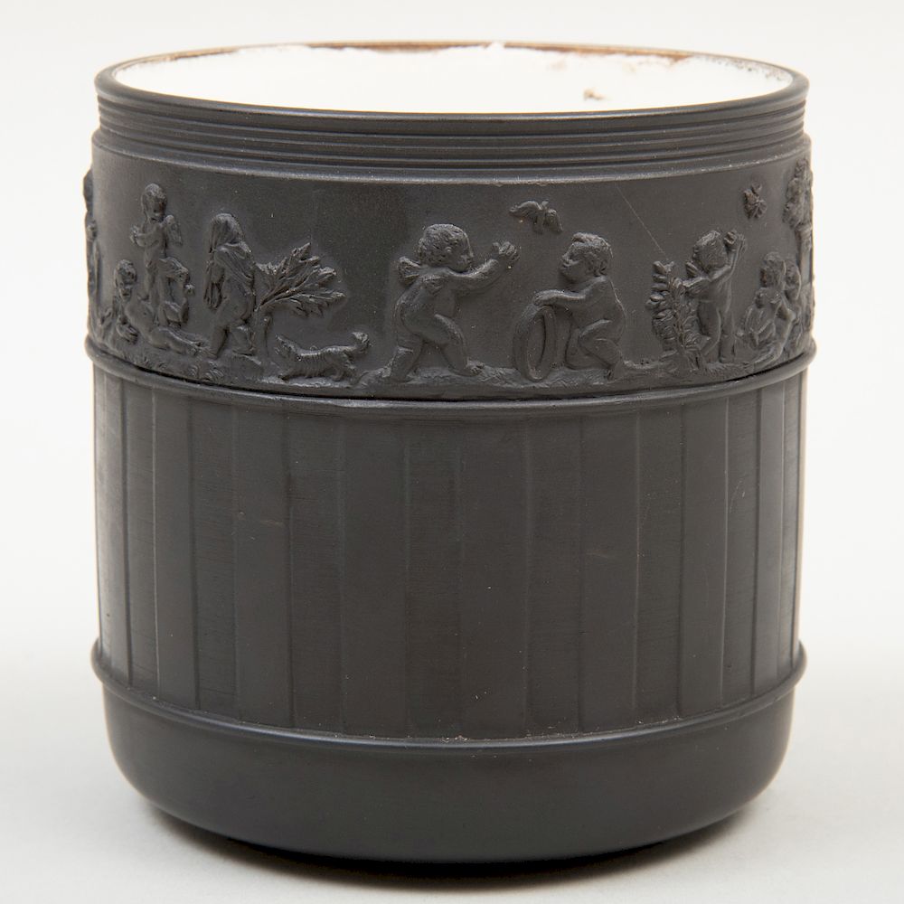 Appraisal: Wedgwood Black Basalt Cylindrical Jar Impressed mark the engine-turned exterior