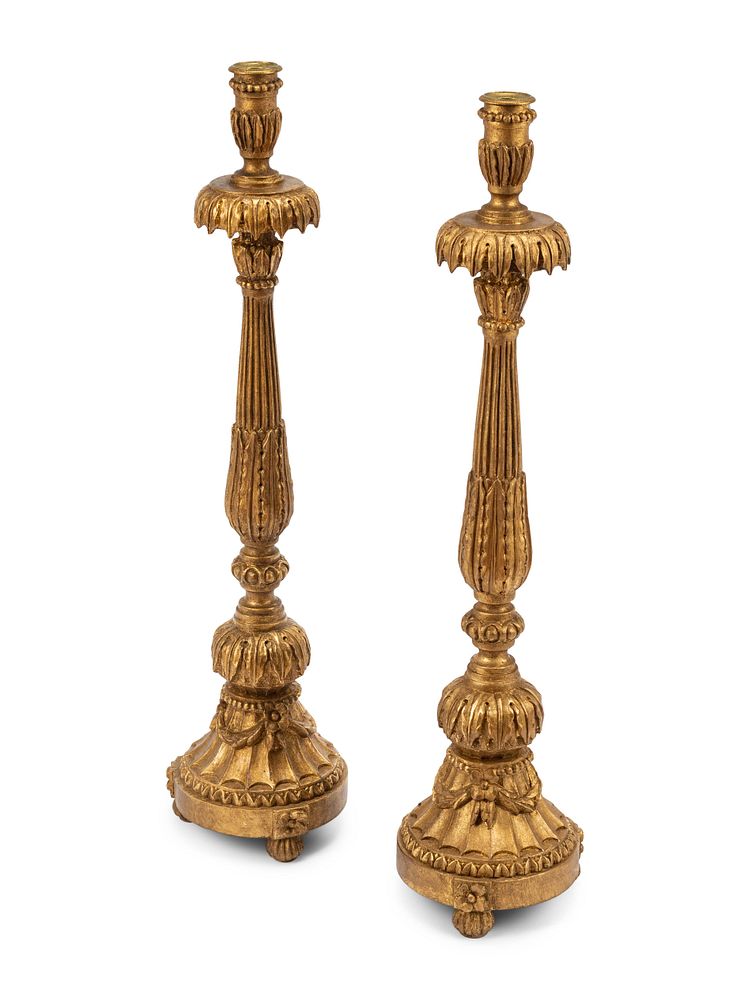 Appraisal: A Pair of Italian Neoclassical Carved and Parcel Gilt Candlesticks